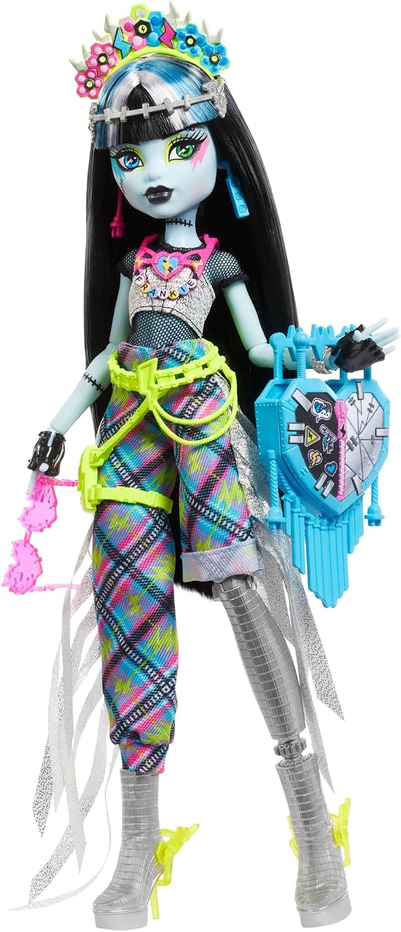 Monster High Frankie Stein Doll with Glamorous Monster Festival Outfit and Festival Accessories such as Sacks Ribbon Poster Statement Bag and More HXH79