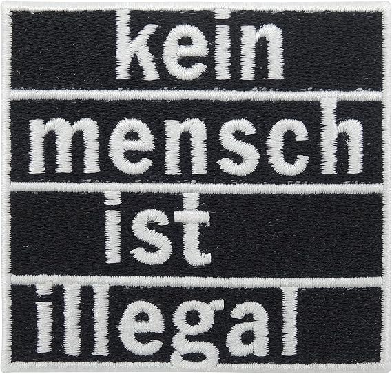 Finally Home Iron-On Patch "Kein Mensch ist illegal" [German Language]